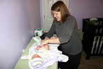First diaper change in her own nursery