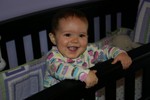 Standing in her crib